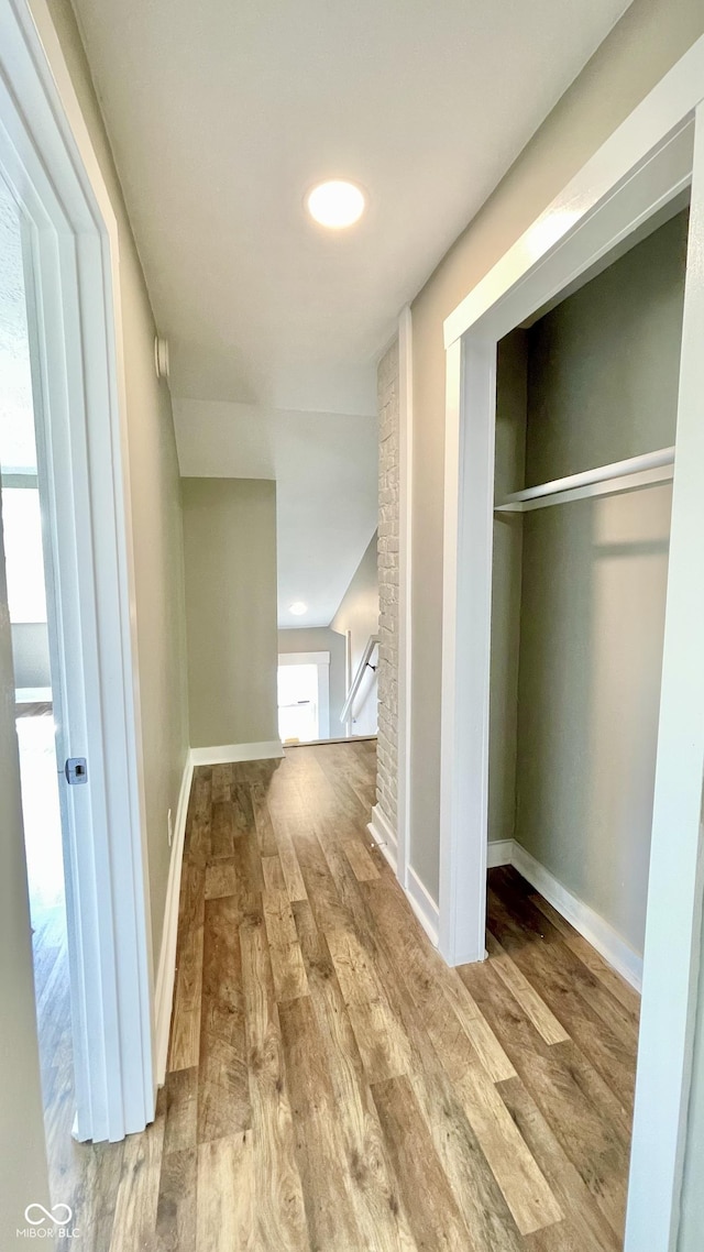 hallway featuring light wood-type flooring