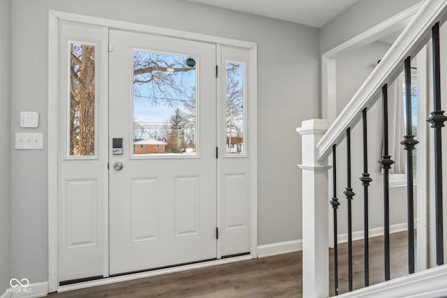 foyer featuring dark hardwood / wood-style floors