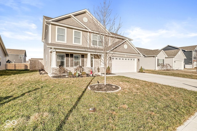 craftsman-style home with a garage, a front yard, and a porch