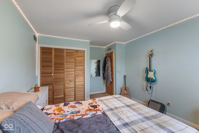 bedroom featuring ceiling fan and a closet