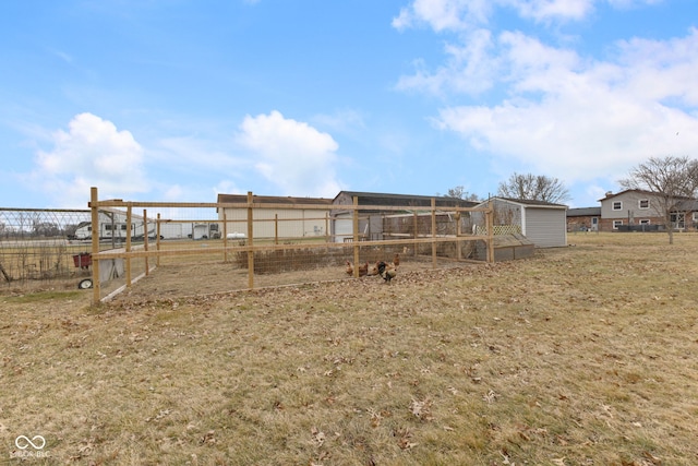 view of yard with an outdoor structure