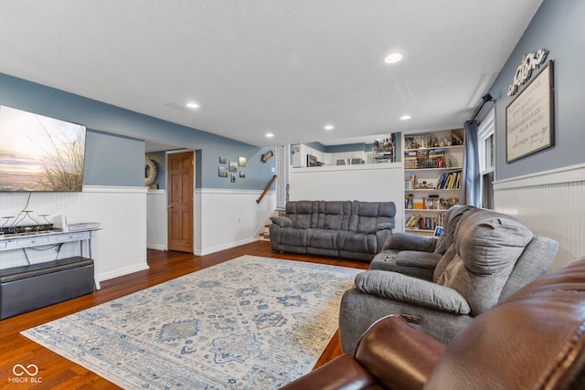 living room featuring dark wood-type flooring