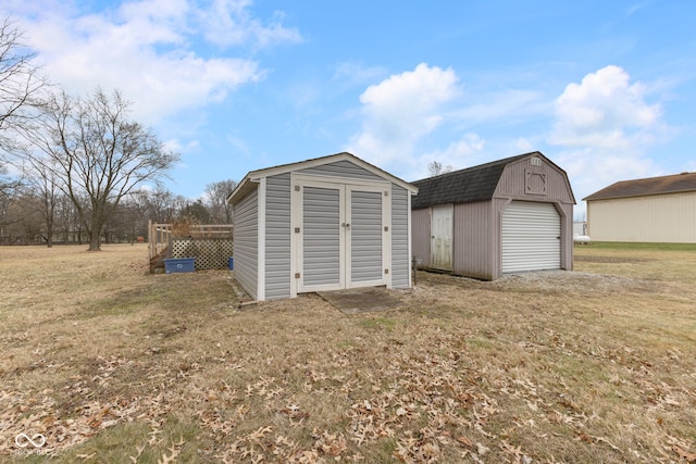 view of outdoor structure featuring a yard