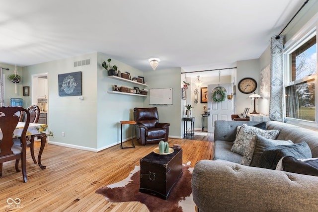 living room with light wood-type flooring