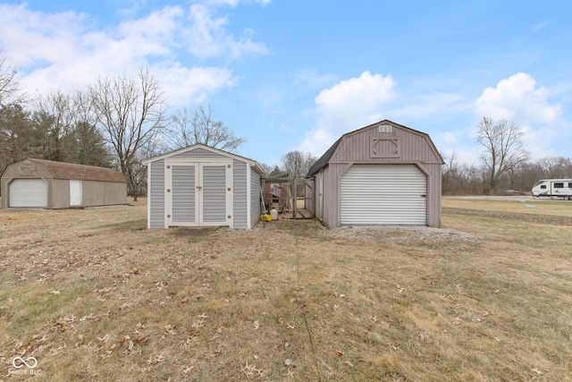 garage with a lawn