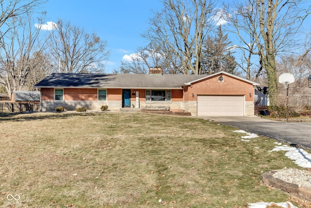 ranch-style home with a garage and a front lawn