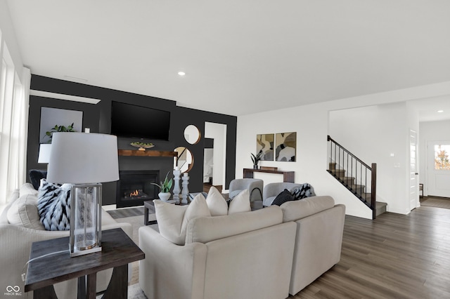 living room featuring dark wood-type flooring