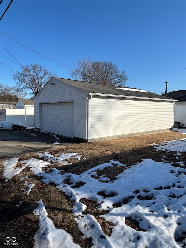 view of snow covered garage