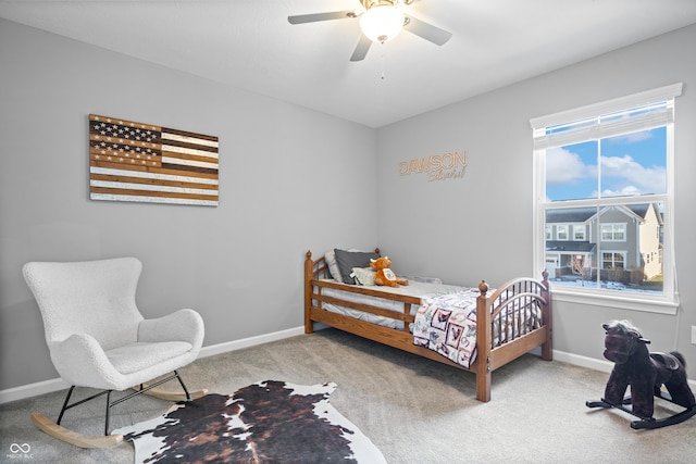 bedroom with ceiling fan and carpet