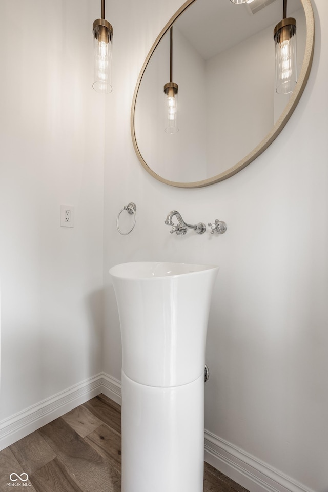 bathroom featuring hardwood / wood-style flooring