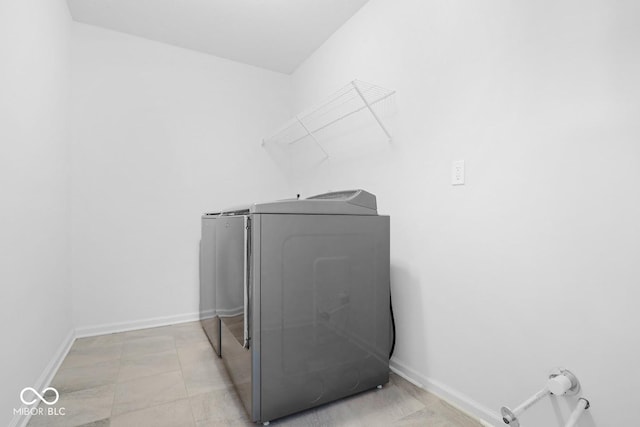 laundry room featuring washing machine and dryer