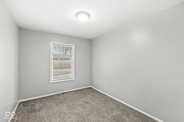 view of carpeted spare room