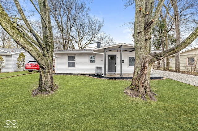 ranch-style house with a front yard