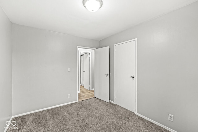 unfurnished bedroom featuring carpet floors