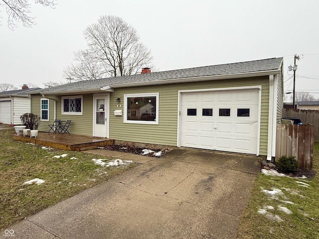 single story home featuring a garage