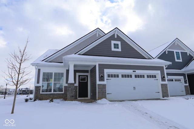 craftsman-style home with a garage