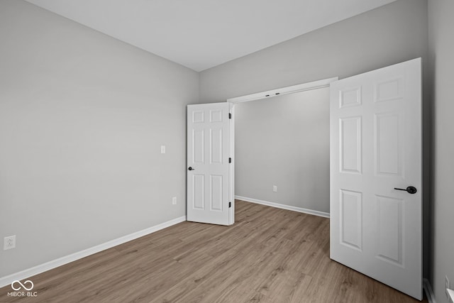 spare room featuring light hardwood / wood-style floors