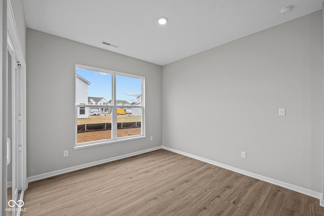 unfurnished bedroom with light hardwood / wood-style flooring