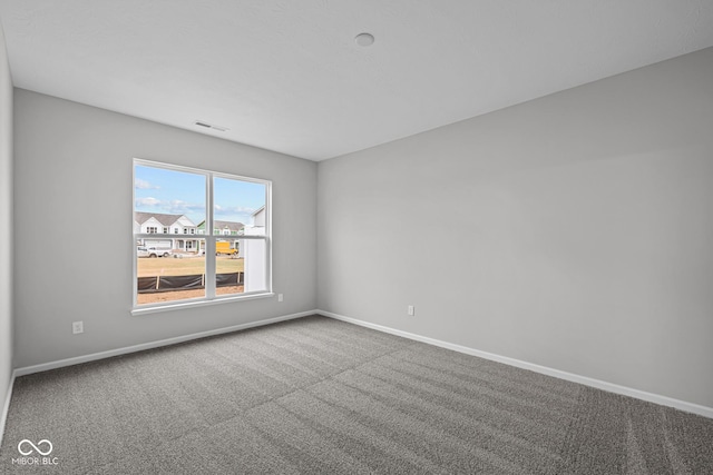 empty room featuring carpet