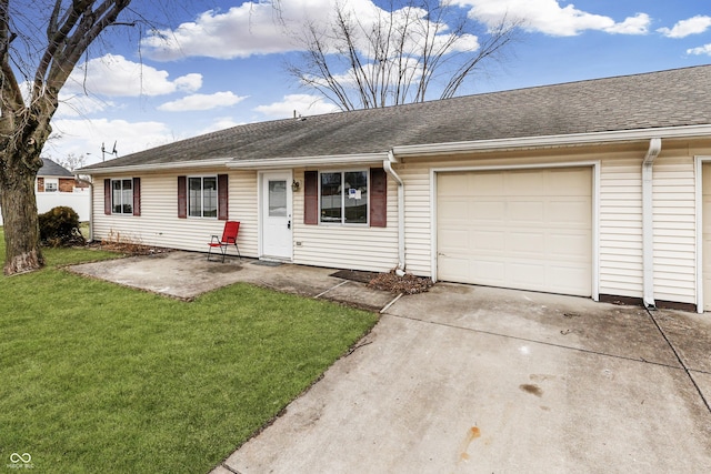 single story home with a garage and a front lawn