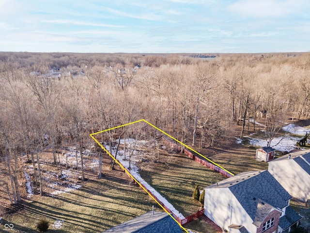 birds eye view of property with a rural view