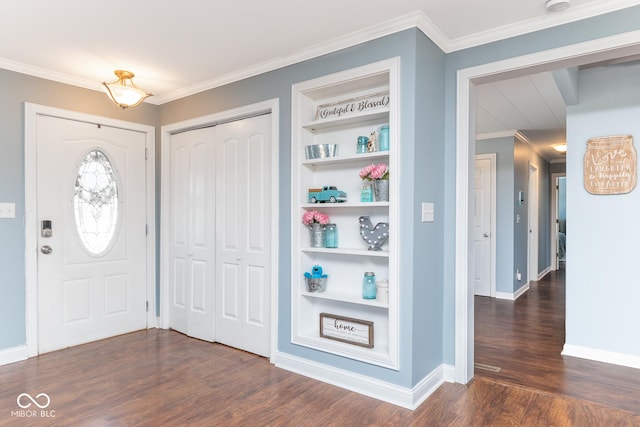 foyer entrance with crown molding and dark hardwood / wood-style flooring