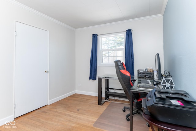 home office featuring ornamental molding and light hardwood / wood-style flooring