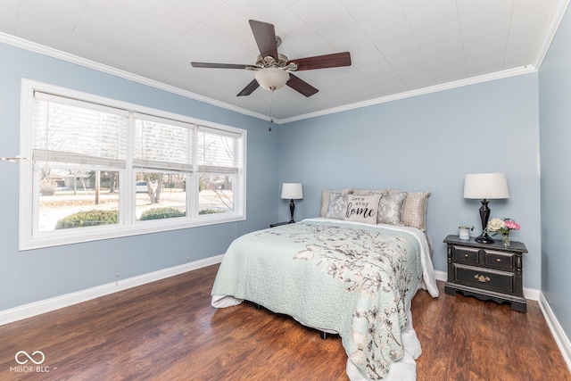 bedroom with ceiling fan, ornamental molding, and dark hardwood / wood-style floors