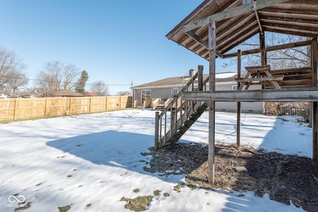 view of yard covered in snow