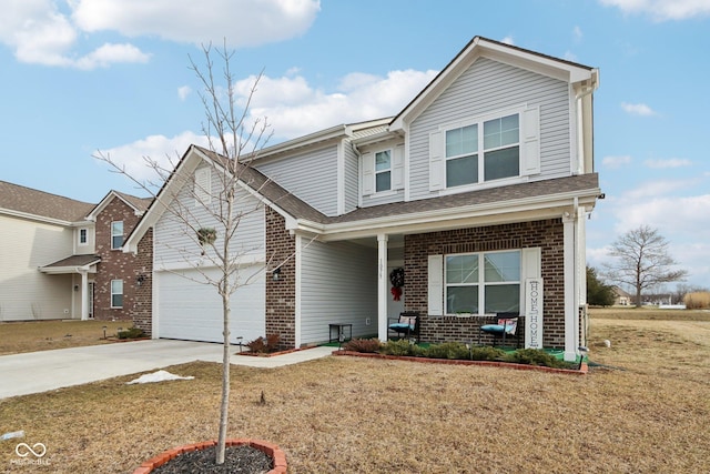 view of front facade featuring a garage and a front lawn