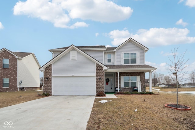 view of front of property featuring a garage, covered porch, and a front lawn