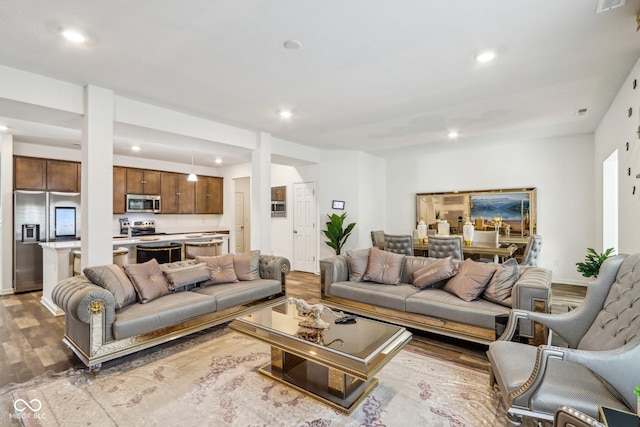 living room with hardwood / wood-style floors