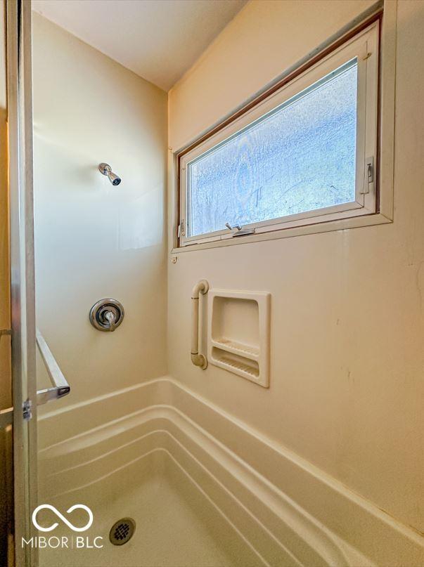 bathroom with walk in shower