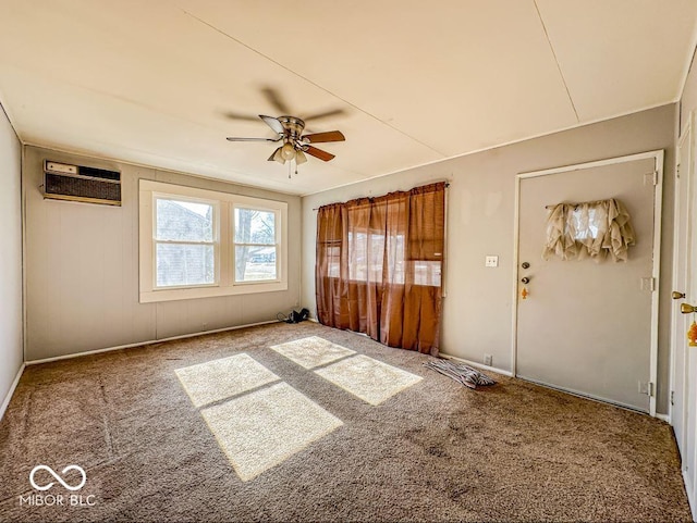 interior space featuring an AC wall unit and ceiling fan