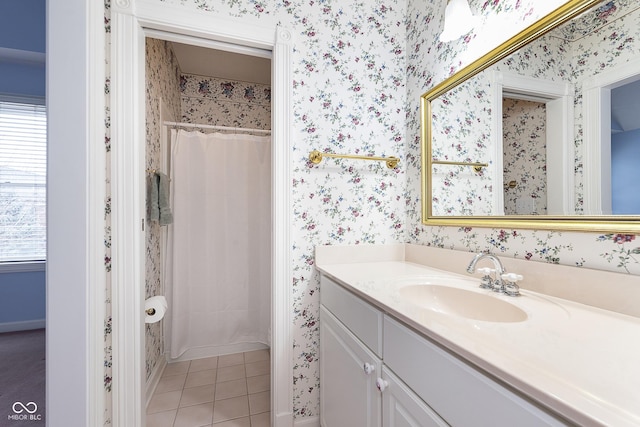 bathroom with tile patterned flooring, vanity, and a shower with shower curtain