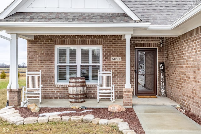 doorway to property with covered porch