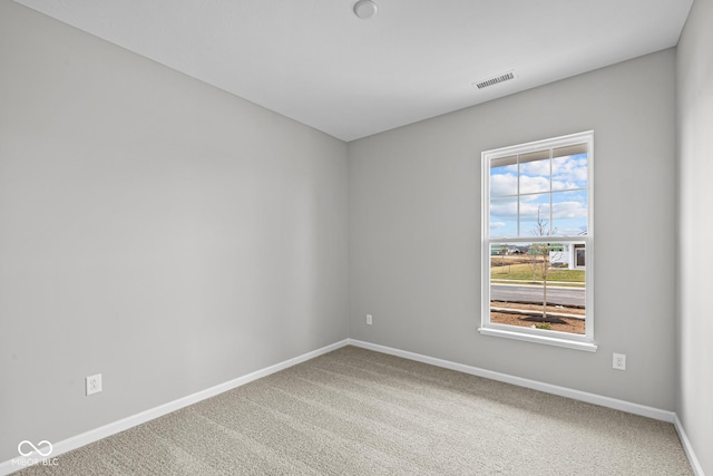 unfurnished room featuring carpet flooring