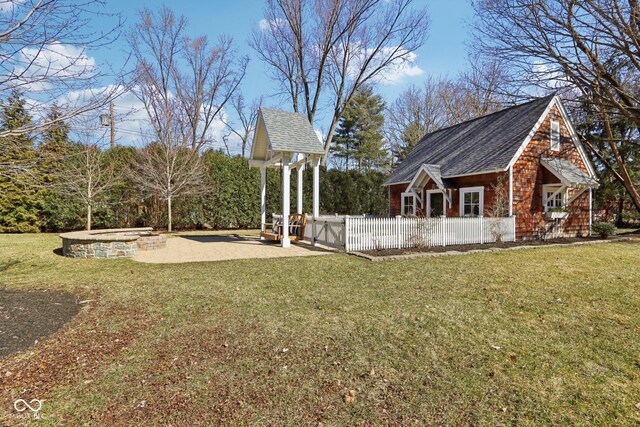 view of yard featuring a patio area and fence