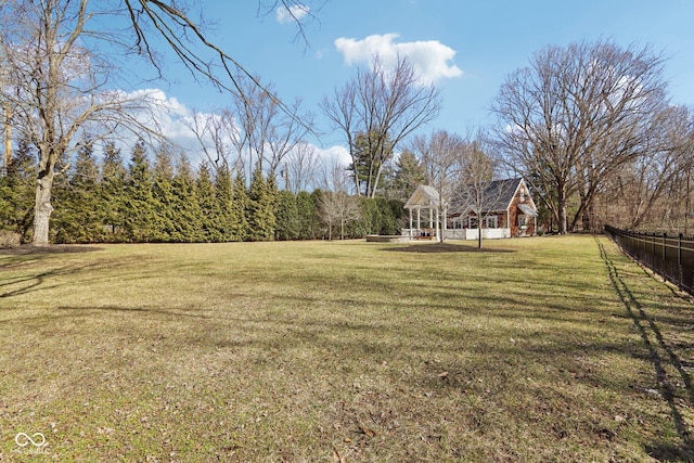 view of yard with fence