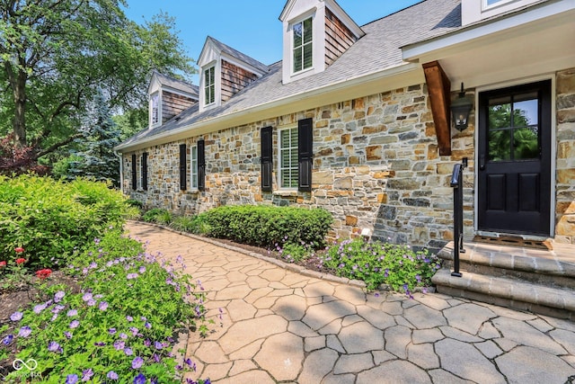 7837 Dean Rd, Indianapolis, IN 46240 - property entrance featuring stone siding