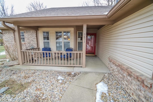 entrance to property with a porch