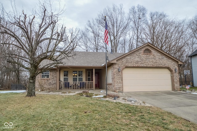 ranch-style home featuring a porch, a garage, and a front lawn