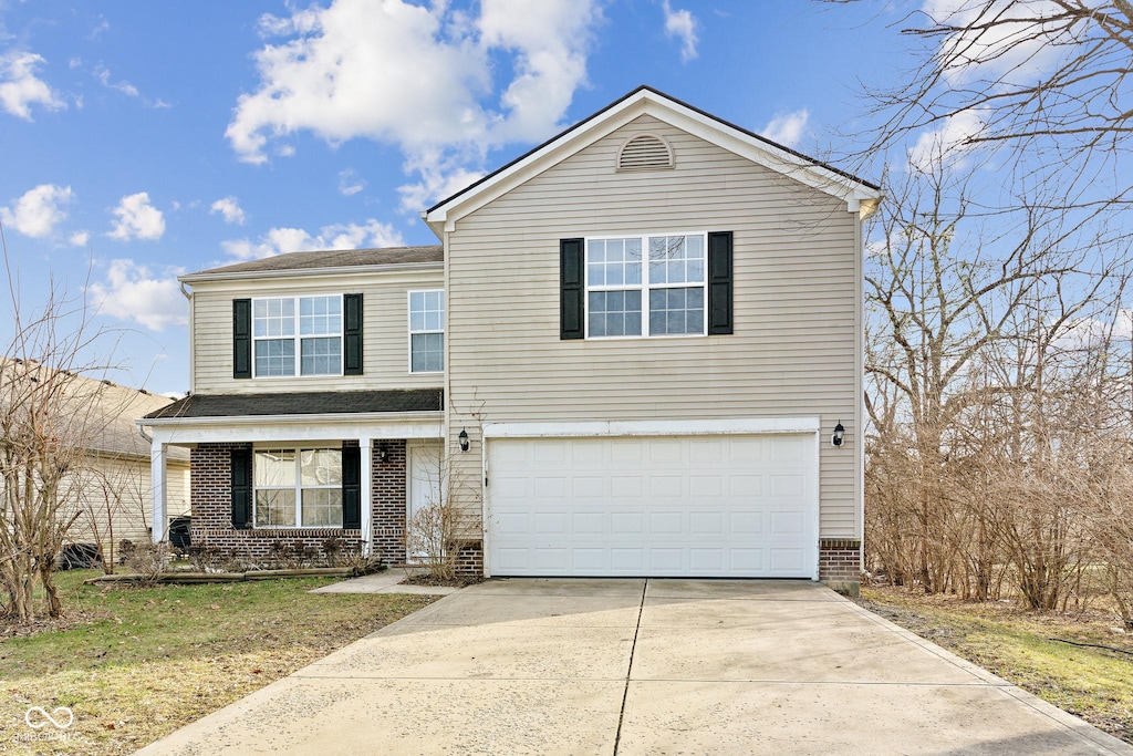 view of front property with a garage