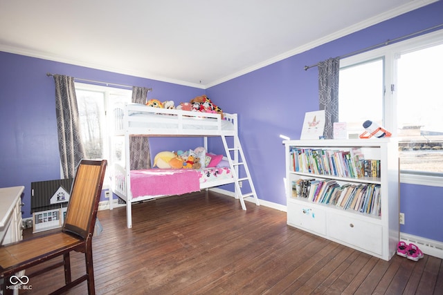 bedroom featuring dark hardwood / wood-style flooring and crown molding