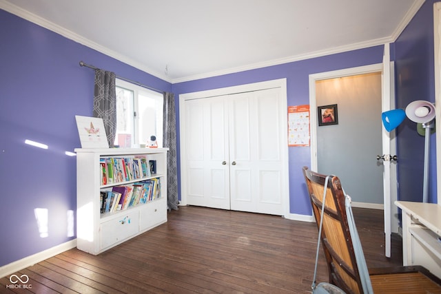 home office featuring crown molding and dark hardwood / wood-style floors