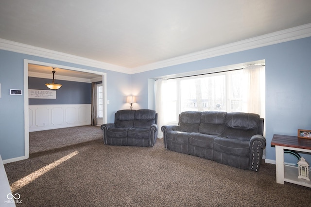 carpeted living room featuring crown molding