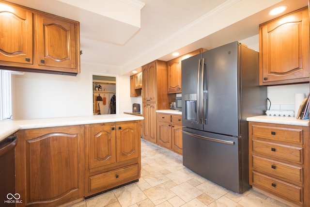 kitchen featuring crown molding and stainless steel appliances