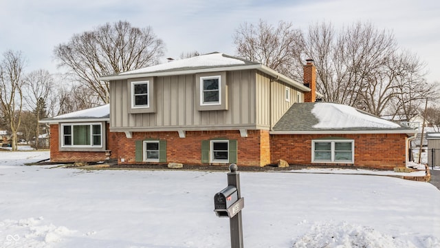 view of snow covered property