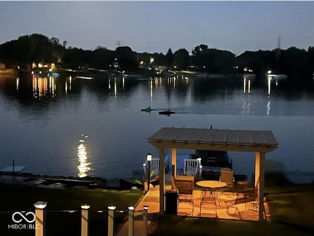 view of dock with a water view