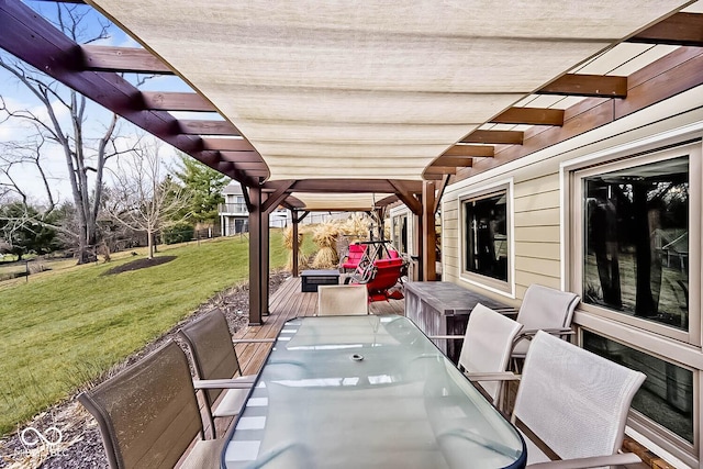 view of patio featuring a wooden deck and a pergola